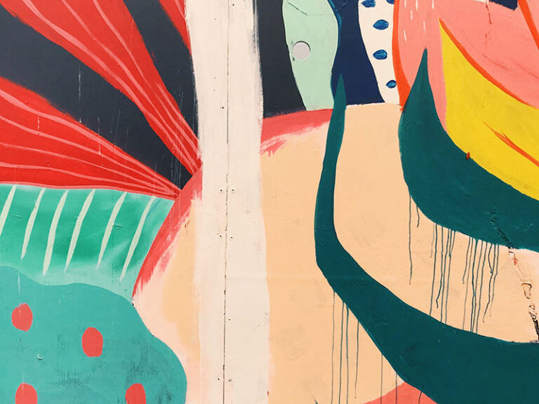 Colorful abstract mural with dripping paint